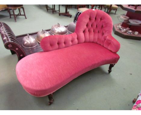 A Victorian walnut deep buttoned single end sofa on scroll cabriole legs and ceramic castors 