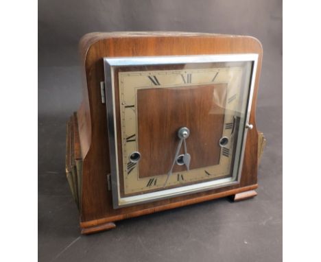 A 1930's mantel clock with a Westminster chime key and pendulum 