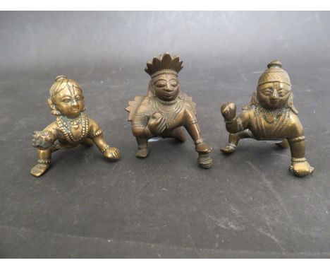 Three 18th/19th Century Indian Tamil Nadu bronze figures depicting the baby Krishna "Balakrishna", height largest example 23/