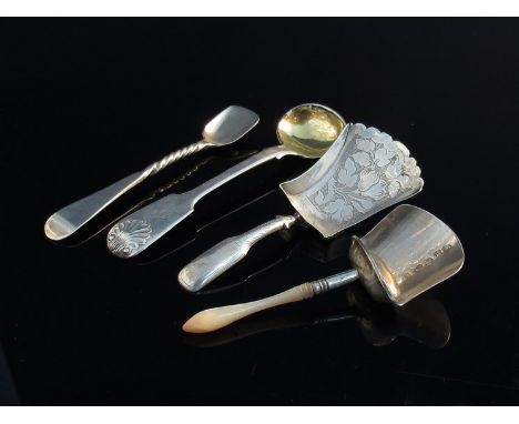 Two Georgian silver caddy spoons, a Georgian silver salt spoon and another (4)