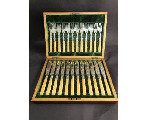 A plated fish knife and fork set in case 