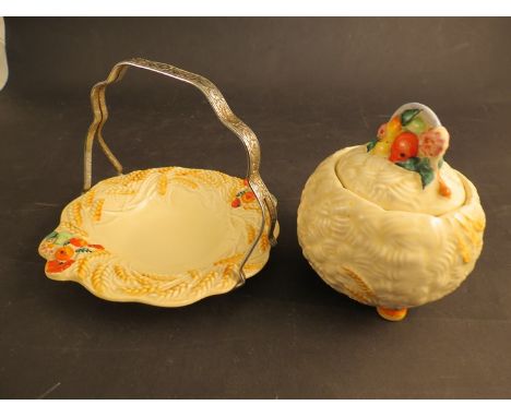 A Clarice Cliff Harvest ware lidded jam pot and dish