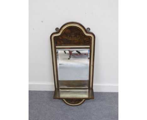 A 19th Century wall hanging bevel edged pier mirror with gilt relief decoration and shelf, 70cm tall