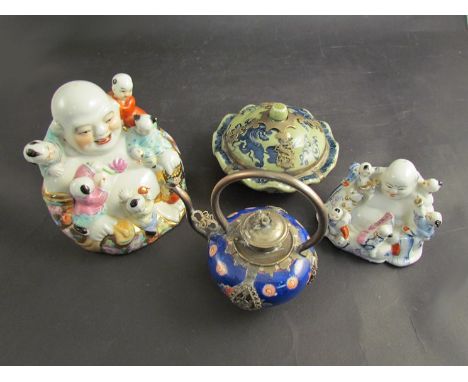 Two Chinese laughing 'Buddha's', a ceramic lidded pot with metal mounts and a novelty Chinese tea pot 