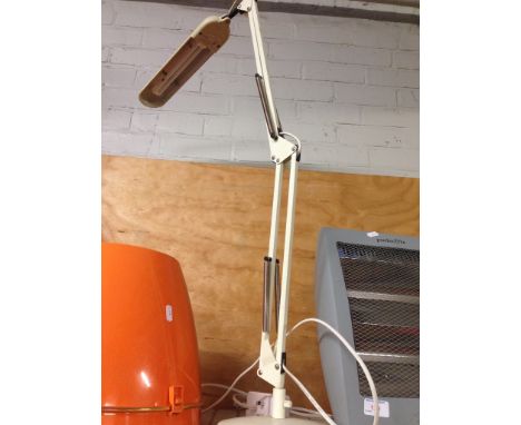 AN ANGLE POISE READING LAMP