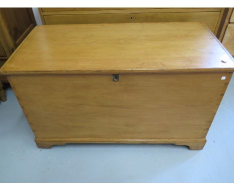A Victorian stripped pine blanket box on bracket feet, with interior candle box - Height 60cm x Width 100cm