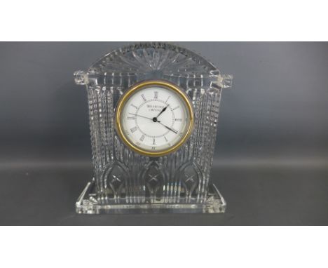 A Waterford crystal cased mantle clock with Roman numerals to white dial