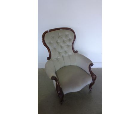 A Victoria button back lounge chair in blue/grey upholstery