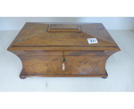 A 19th century mahogany tea caddy with two internal caddies and a plated caddy spoon - Height 17cm x 36cm x 21cm