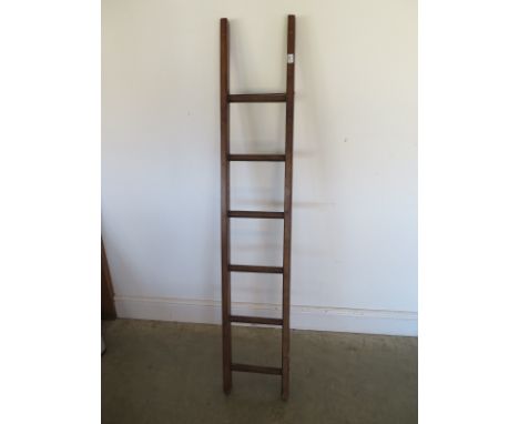 A six rung polished ladder - Height 150cm