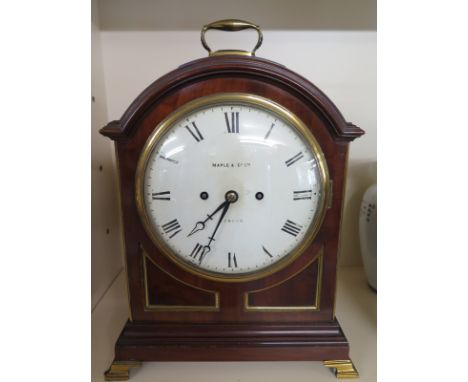 An early 20th century mahogany and lacquered bracket clock, splayed bracket feet with 8 inch convex dial, Roman numerals, sig