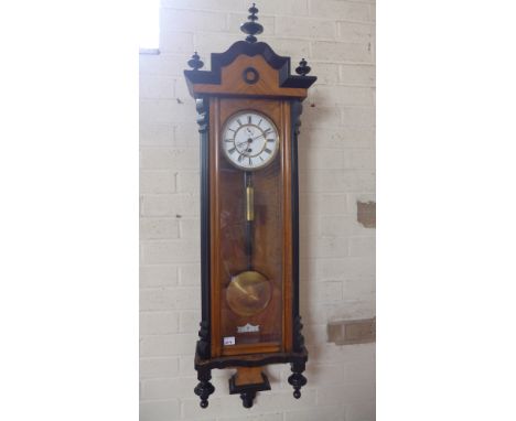 A 19th century single weight walnut Vienna wall clock with secondary dial - Height 123cm - the works have been restored to wo