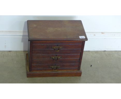 An Edwardian oak three drawer trinket chest - Height 30cm x 34cm x 20cm