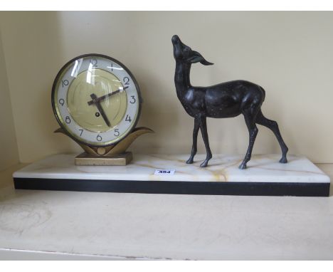 An Art Deco marble mantle clock with metal deer mount - face marked Silvoz Paris - Length 50cm