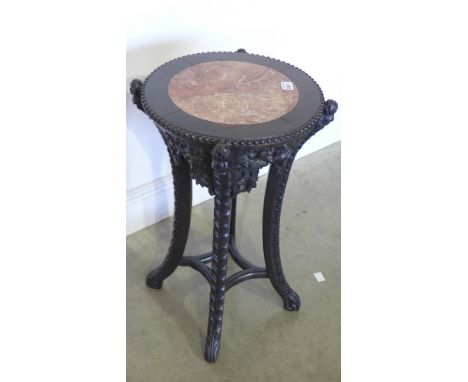 An Oriental hardwood marble top jardiniere stand - Height 60cm x Diameter 35cm