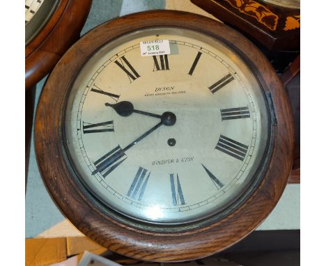 A 19th century wall clock in oak circular case, with single train fusee movement, lettered "Dyson Clockmaker to the King Wind