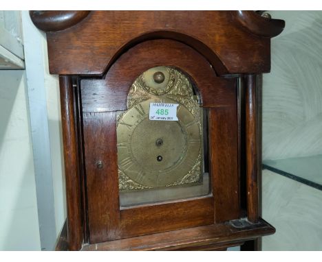 A dwarf longcase clock, the oak case with swan neck pediment and turned pillars to the hood and reeded corners to the trunk, 