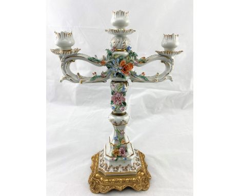 A 3 branch candelabrum, encrusted in the Dresden style a few small nicks in bocage but otherwise good condition with no other