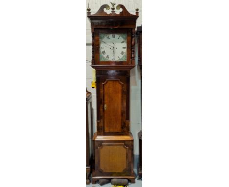 A 19th century longcase clock in crossbanded oak and mahogany case, with brass finials, swan neck pediment and turned columns