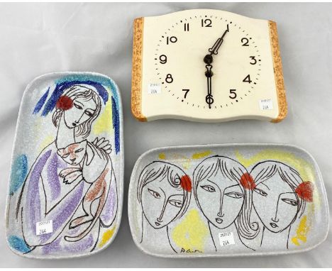 A 1950's continental ceramic kitchen clock, 22 cm; a pair of similar Italian wall plaques -clock has chip t rear edge unseen 