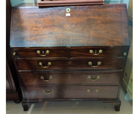 A Georgian crossbanded mahogany bureau with fall front fitted interior, 3 long and 2 short drawers with swan neck handles, on