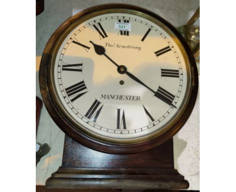 A wall/mantel clock in stained wood round case, single train fusee movement by Thos Armstrong Manchester, diameter 37 cm 