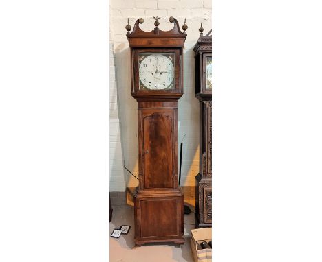 An early 19th century inlaid mahogany longcase clock with brass finials and square reeded columns to the hood, full length do