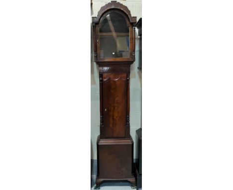 A Georgian mahogany longcase clock case, the arched hood with fretwork pediment and turned side columns, compressed arched fu