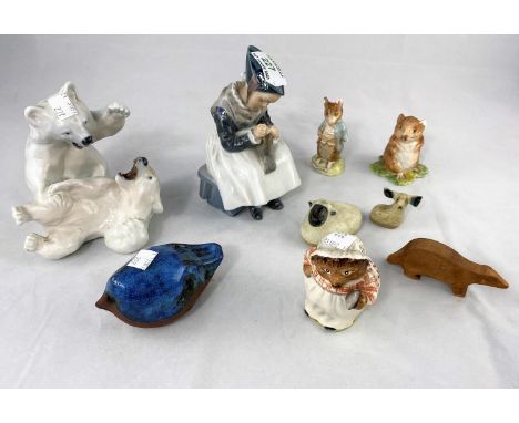 A Royal Copenhagen figure of a seated Amish girl and a group of 2 fighting polar bears; 3 Beswick Beatrix Potter figures (2 a