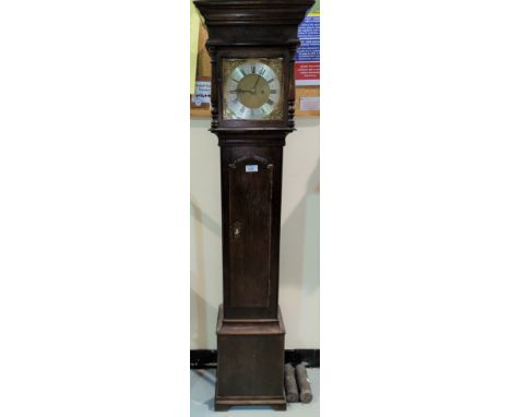 An 18th century style dwarf longcase clock in oak case, with turned pillars to the hood and arched full length door, brass di