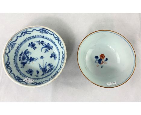 A Chinese ceramic bowl decorated with flowers, diameter 11cm and another small blue and white dish 1st bowl 'rings' nicely, m