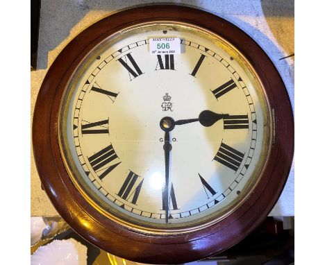 A George V GPO wall clock in mahogany case with single train fusee movement, diameter 36 cm (no pendulum)  No pendulum. The c
