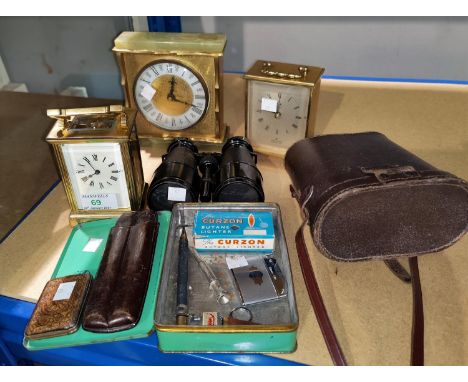 A modern mantel clock by Mappin &amp; Webb; other clocks; a pair of binoculars; smoking requisites 