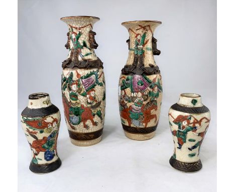 An early/mid 20th century Chinese pair of small vases of inverted baluster form with crackle glaze, decorated in polychrome w