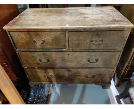 A 19th century stained wood chest with 2 long and 2 short drawers with brass swan neck handles, on bracket feet, width 93 cm 