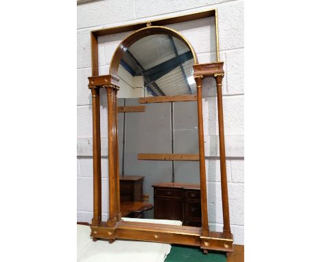 An overmantel mirror in architectural arch top frame, flanked by double columns, 112 x 71 cm 