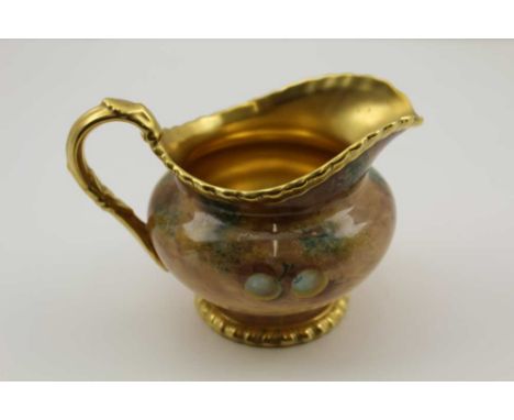 A ROYAL WORCESTER BONE CHINA MILK JUG, hand painted fruit decoration, signed, with gilded handle and interior, gadrooned rims