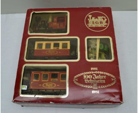 AN LGB G SCALE LECHMANN 1881-1981 100 FAYRE THREE PIECE RAILWAY SET with 0-4-0 locomotive and 2 passenger coaches in OVB 