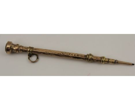 A LATE VICTORIAN YELLOW METAL PROPELLING PENCIL, having engraved decoration, seal end with suspension ring 