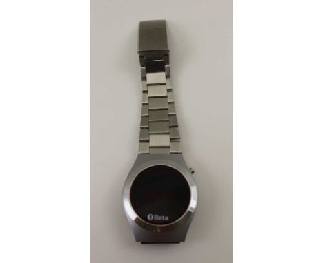 A "BETA" DIGITAL DISPLAY WATCH, with press button, red dial, stainless steel bracelet strap 