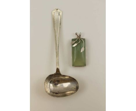 A SILVER POURING SPOON, Sheffield 1926, together with a silver mounted JADE PENDANT 