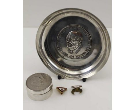 A SILVER DISH COMMEMORATING THE RT HON SIR WINSTON CHURCHILL KG, O.M., C.H., M.P. (1874-1965) the dish has a portrait to the 