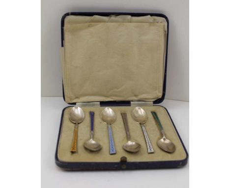 TURNER &amp; SIMPSON A CASED SET OF SIX SILVER AND ENAMEL COFFEE SPOONS, each with different coloured enamel to the handles, 