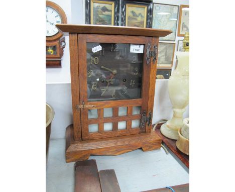Los Alamos Eight Day Mantle Clock, in oak arts and crafts case, with butterfly hinges to port cullis door, 29.5cm wide, New H