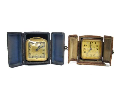 An S.H Laneill Ltd Gilt Metal Travelling Clock, of canted square form, bun feet, in leather case, 6cm high; Another, similar.