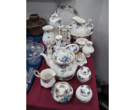 Royal Albert 'Moonlight Rose' Table China, of twenty-six pieces including teapot, clock, together wtih a damaged vase and sug