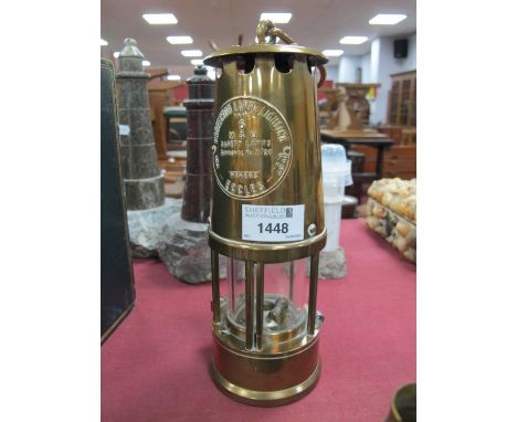 Miners Lamp, Protector Lamp &amp; Lighting Co, Eccles, 24.5cm high with handle down.The catch opens, igniters mechanisms all 