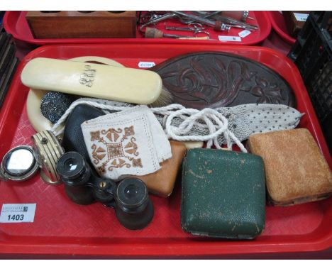 Misers Purse, travelling clocks, pokerwork carved hand mirror, compass, binoculars:- One Tray.