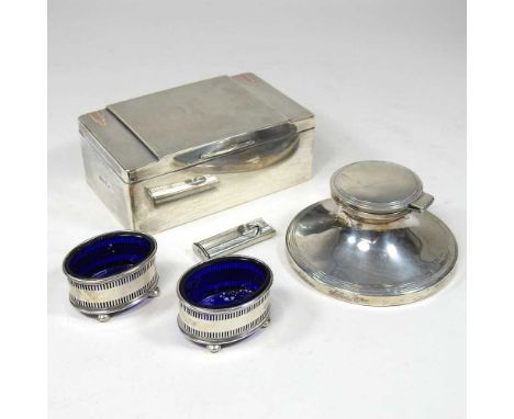 A pair of early 20th century silver salts, together with a silver table cigarette case, a silver inkwell and a cigar cutter (