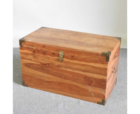 A brass bound hardwood trunk, with a hinged lid89w x 47d x 51h cm